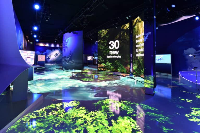 A spectacular arrangement of digital displays forms an LED Gigawall, showing experiential marketing agency SPIRO’s trade show design and new marketing technology mastery