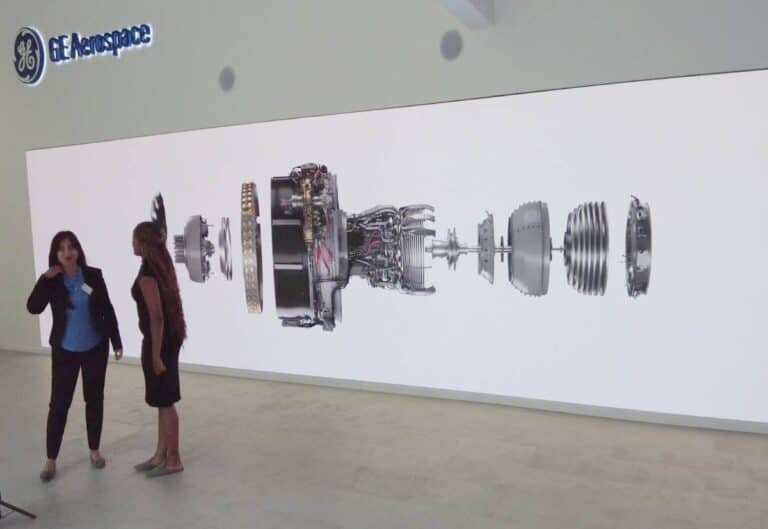 A giant LED shows a Boeing engine as part of experiential marketing agency SPIRO’s expo booth design for GE